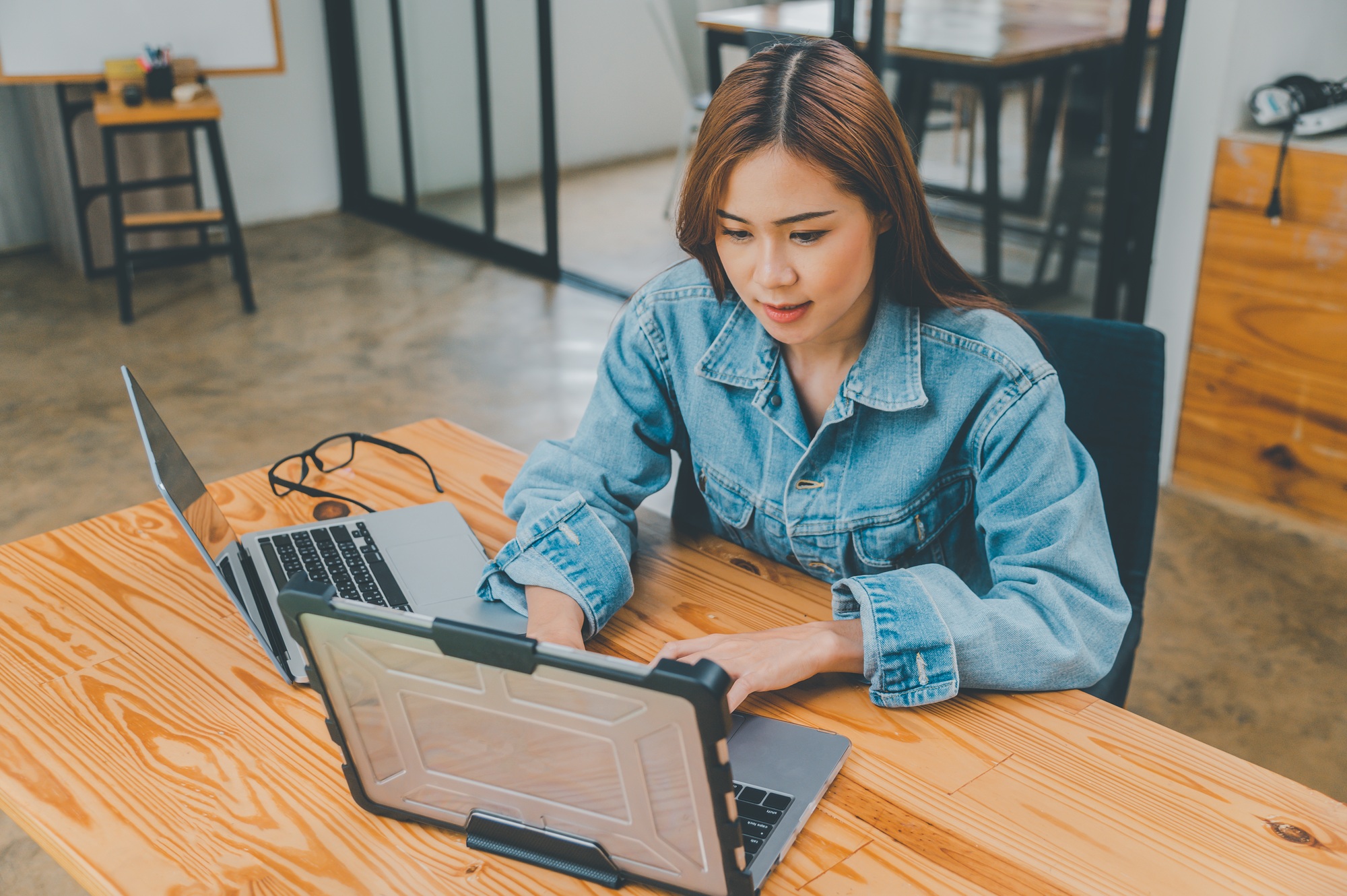 Female programmer working on coding, software development and web design